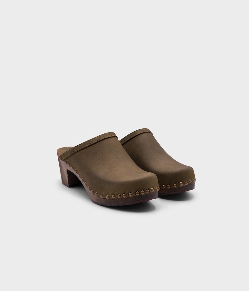 High heel studded clog mules with Olive green nubuck leather and dark brown wooden base.