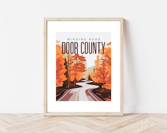 May include: A framed print with a retro-style illustration of a winding road through a forest in Door County, Wisconsin. The text "WINDING ROAD DOOR COUNTY" is printed in brown letters on a white background.
