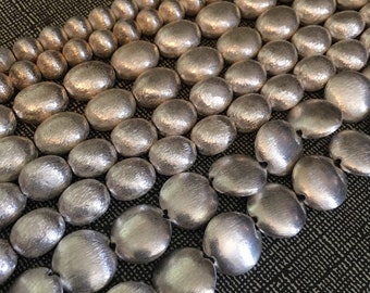 Brushed matte silver beads oval, disk and round strand