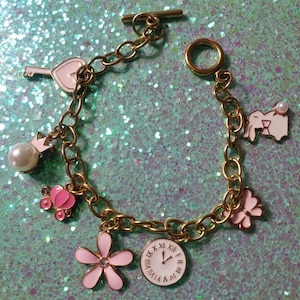Fantasy charm bracelet/ pink pearl gold accents