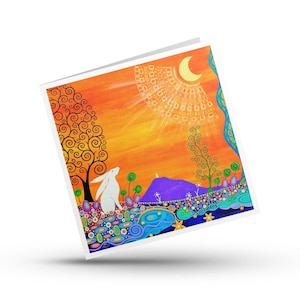 May include: A square greeting card featuring a vibrant painting of a white hare standing in a colorful field of stylized flowers and swirls under an orange sky with a yellow crescent moon and a geometric sunburst pattern above a purple hill.