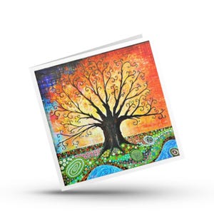 May include: A square greeting card featuring a vibrant painting of a dark, leafless tree with swirling branches set against a bright orange and yellow sunset background. The foreground displays a colorful landscape with green, blue, and pink patterns.