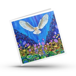 May include: A square greeting card featuring a vibrant painting of a white owl in flight above a small mouse. The background displays a deep blue sky, swirling purple and pink circular patterns, and green foliage with intricate, colorful details.