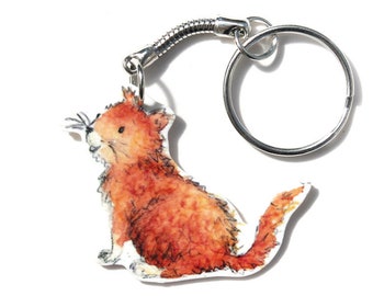 May include: A keychain featuring a watercolor illustration of a ginger cat. The cat is sitting, with its tail curled. The keychain has a silver-colored metal ring and a flexible metal connector.