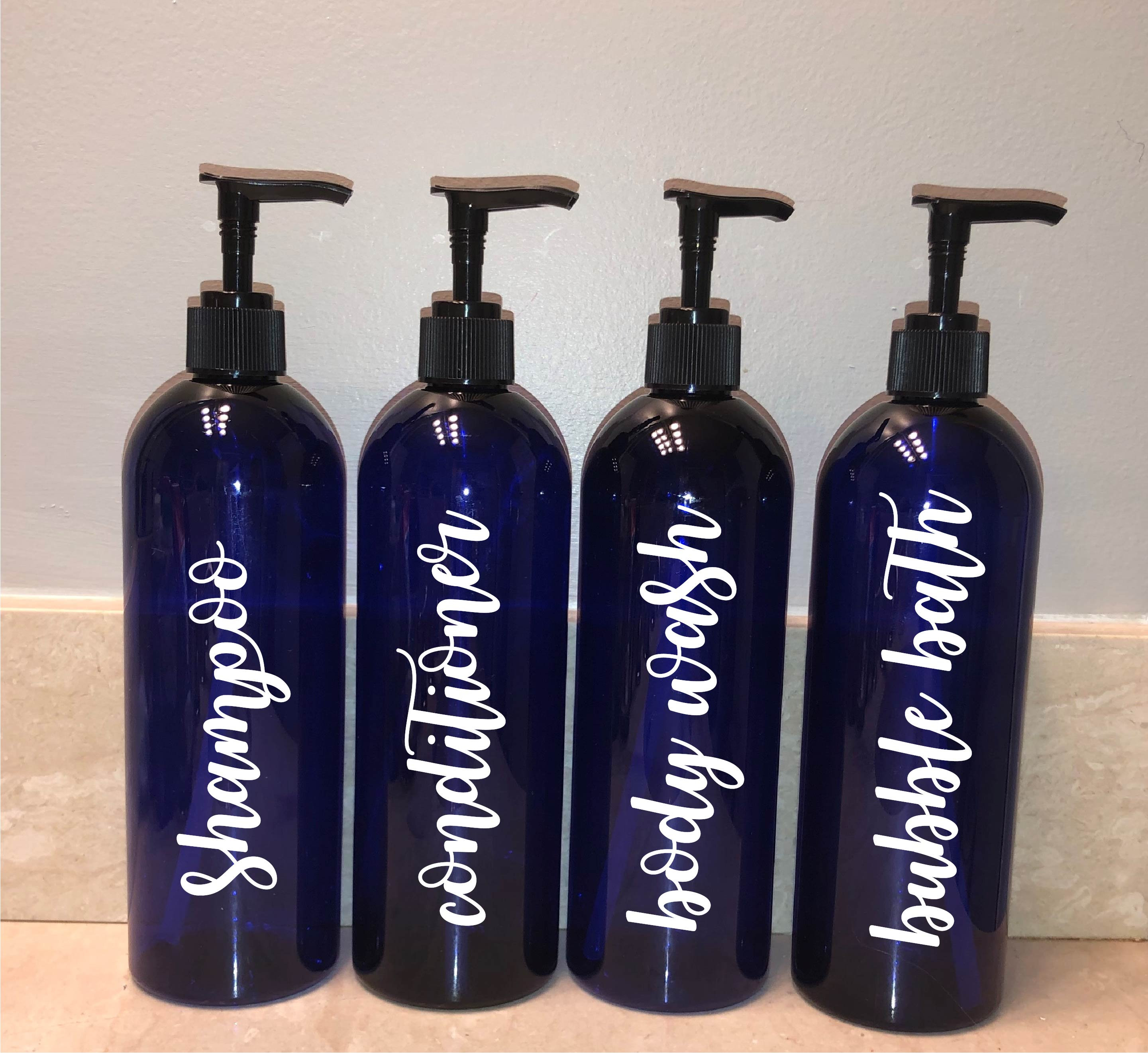 ブルーのシャンプー＆コンディショナーボトル | バスルームボトル