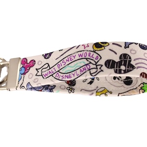 Disney Sketch Fabric Keychain. Pattern placement may vary.