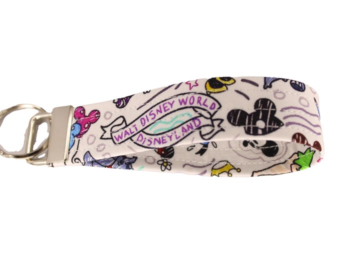 Disney Sketch Fabric Keychain. Pattern placement may vary.
