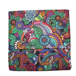 May include: A colorful, patterned fabric item with a vibrant floral design. The design features a mix of flowers and leaves in shades of blue, green, purple, orange, and red. The item is folded, suggesting it could be a wallet or case.