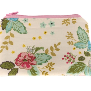 Witte en roze portemonnee met bloemen