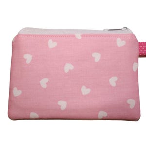 Harten op roze portemonnee