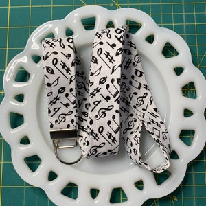 Musiknotizen auf White Lanyard