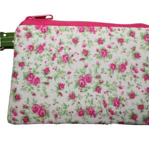 Roze portemonnee met bloemen