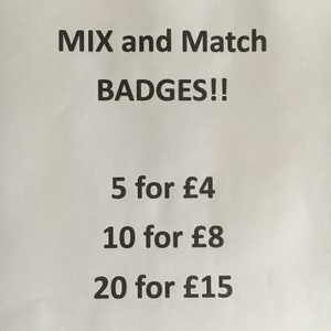May include: A sign advertising mix and match badges. The sign lists prices for 5, 10, and 20 badges.