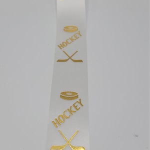 Hockey Stick and Puck Homecoming Ribbons, Mums