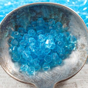 250 Pcs Light Blue Bicone Beads - Translucent Glass Beads - 4-5mm Smooth Finish Bicones - 3 Full 14 Inch Strands - Glass Bicone Beads #S5366