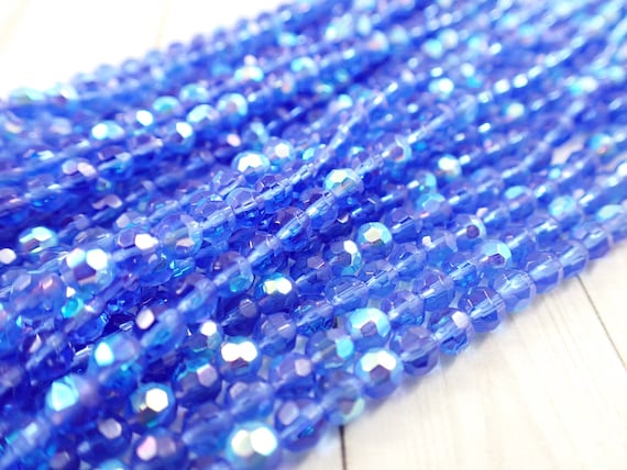 RUBYCA Perline Di Vetro Pressato Ceche 6 Mm - Cristalli Rotondi Per Gioielli Fai Da Te - Colore Blu, 1 Filo (circa 64 Pezzi)