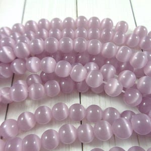 67 Pcs Purple Cat Eye Beads - 6mm Round Smooth Glass Beads - Bright Shiny Light Purple - Cats Eye Beads - Full 14 Inch Strand #S5113