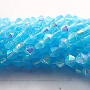 250 Pcs Light Blue Bicone Glass Beads - Small 4mm Smooth Finish - Bicone Turquoise Beads - Rainbow AB Finish - 3 Strands Blue Glass #S5252