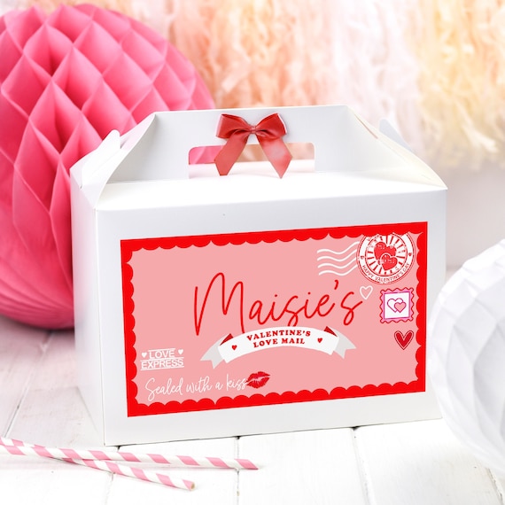 Gift box with blue ribbon on white marble background, top view. Gifts,  celebration, valentines theme Stock Photo