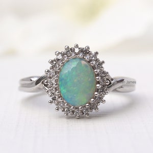 FINLEY - 0.22ct Opal & Diamond Halo Ring