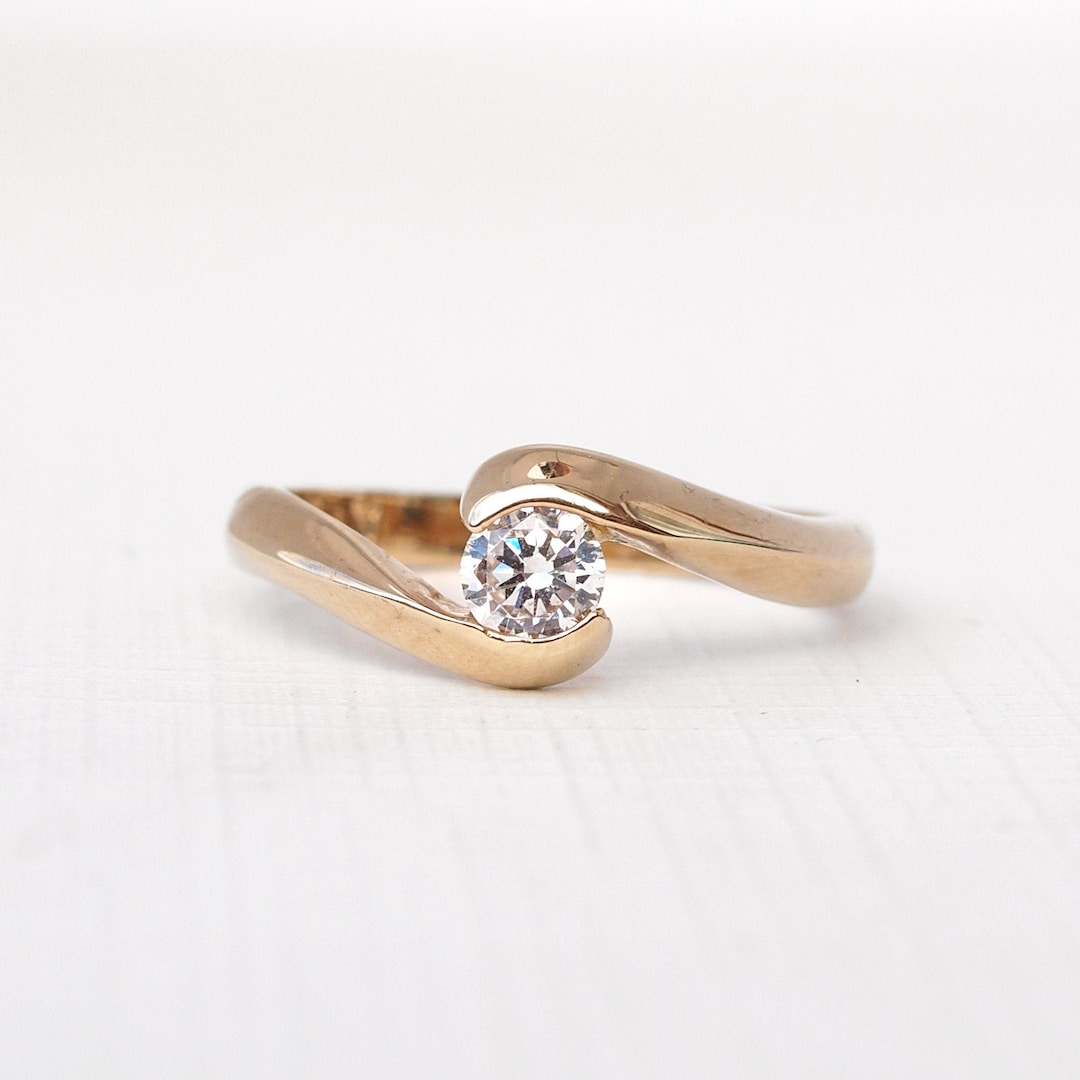 Buy GRACE Solitaire Diamond Twist Engagement Ring - Main Image