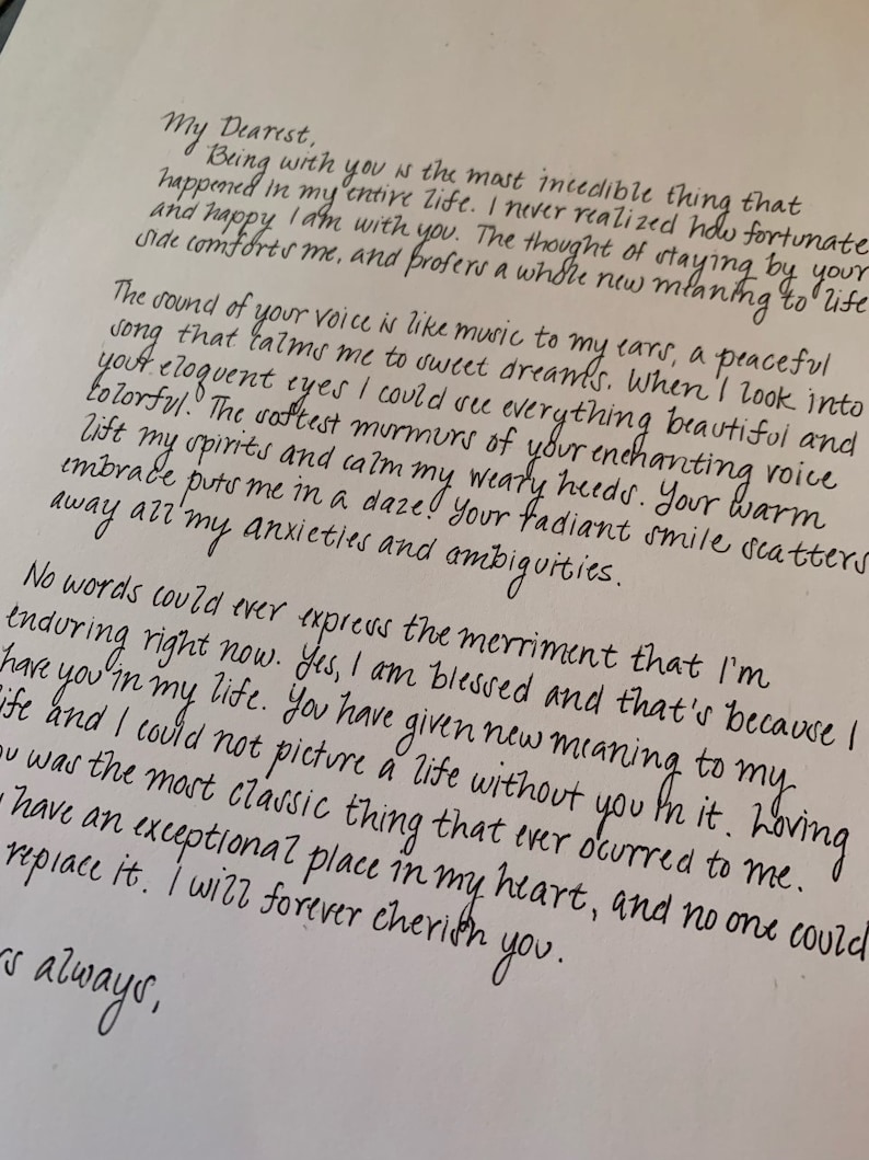 May include: A handwritten letter on cream-colored paper with black ink. The letter is addressed "My Dearest" and contains romantic prose. The script is elegant and flowing, with a personal and intimate tone. The letter is signed "Yours always."
