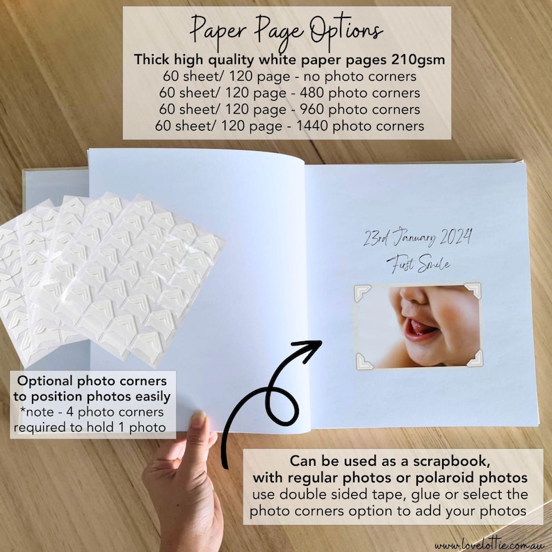 May include: An open scrapbook with thick white 210gsm paper pages. The left side shows sheets of adhesive photo corners. The right side displays a photograph of a baby's smile with the text 23rd January 2024 First Smile. Text overlays describe paper options and usage.
