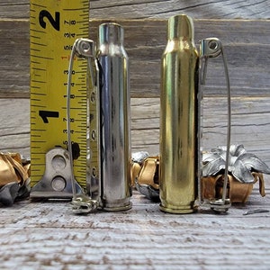 Photographed is the 223/556 casing. Pleases note this boutonniere is 1 and 7/8 inches in height