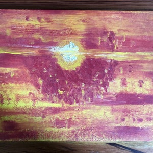 May include: Abstract painting on canvas with a red and yellow color scheme. The painting depicts a sunset with a white sun in the center.