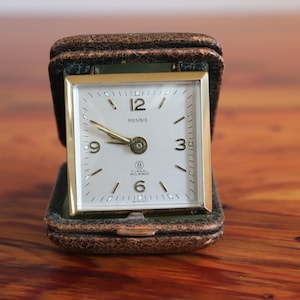 Rensie 1950's alarm clock in a leather travel case 7 Jewel, 8 Day, vintage clock, Antique clock, original