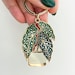 see more listings in the Enamel Keychains section