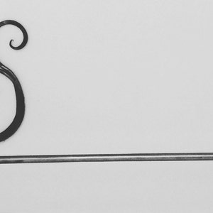 Scroll design wrought iron towel bar