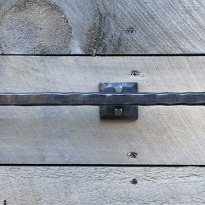 Rustic wrought iron towel bar