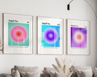 May include: Three framed prints with colorful gradient circles and the text "Angel No." followed by a number. The prints are hanging on a white wall above a gray couch with pillows.