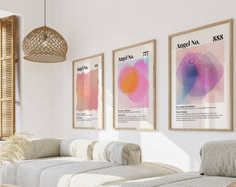 May include: Three framed prints with abstract watercolor designs in pink, orange, and blue. Each print features the text "Angel No." followed by a three-digit number: 111, 777, and 888. Below each number is a description of the angel number's symbolism and meaning.