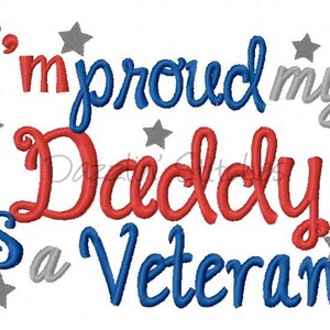 May include: Embroidered design with the text "I'm proud my Daddy is a Veteran" in red, blue, and gray lettering with stars.