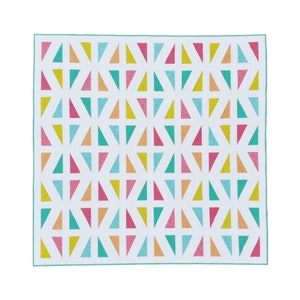 May include: A white quilt with a geometric pattern of colorful triangles. The triangles are in shades of pink, orange, yellow, blue, and green.