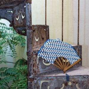Crossroads geometries Crafted wooden hand fan