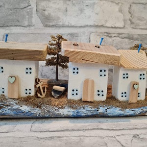 Little driftwood beach scene with trees and boat, anchor, life bouy. Coastal art, driftwood scene, seaside art, coastal decor.