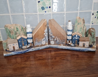 Nautical driftwood bookends, with lighthouse,cottages in a beach with boat,anchor,sand and cliffs