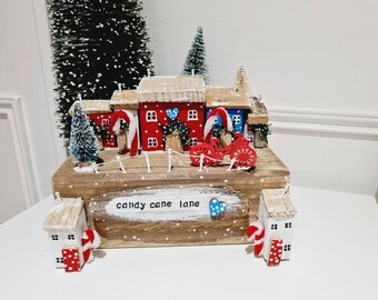 Candy cane lane.beautiful village with candy canes,tree,cottages,wooden hearts,bike.vibrant christmas colours, with hand stamped plaque.