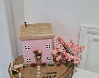 Mums house.pretty pink cottage set on wood slice with flowers and blossom tree and benchand fence.mothers day.motheringsunday.mum gift