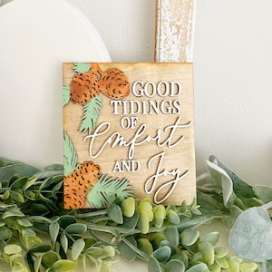 Good tidings and comfort and joy sign, tiered tray Christmas theme, neutral Christmas