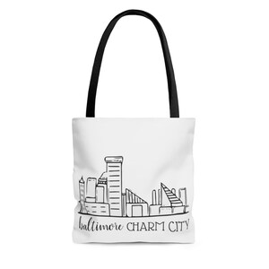 Reversible city tote with store skyline print