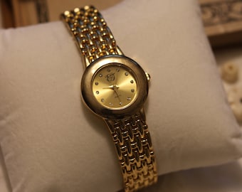 Women's quartz top watch prices