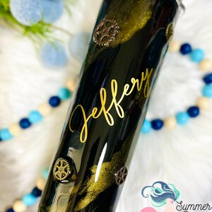 May include: Black tumbler with gold accents and the name "Jeffery" in gold script. The tumbler is decorated with bronze-colored gears. The Summer Rose Shoppe logo is visible in the bottom right corner.