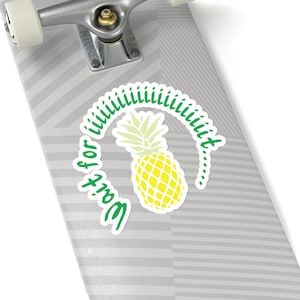 May include: A green and white sticker with a pineapple and the text "Wait for it..." in a circle.