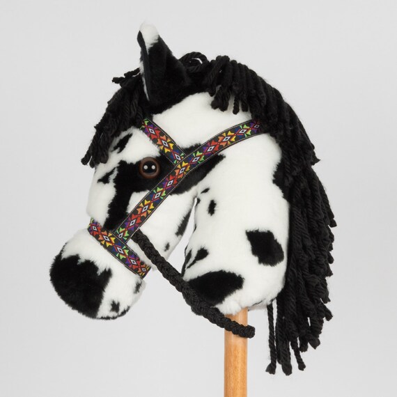 white stick horse