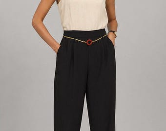 Vintage zwarte jumpsuit uit de jaren 90 | Eendelig broekpak met rits | GROOT: