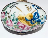 Egg Shape Limoges Box with Bonnet, Garden Rake, and Shovel Retired Mint